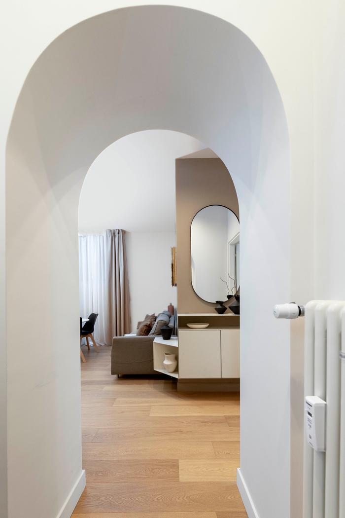Arched hallway of the luxury apartment in Prati, Rome